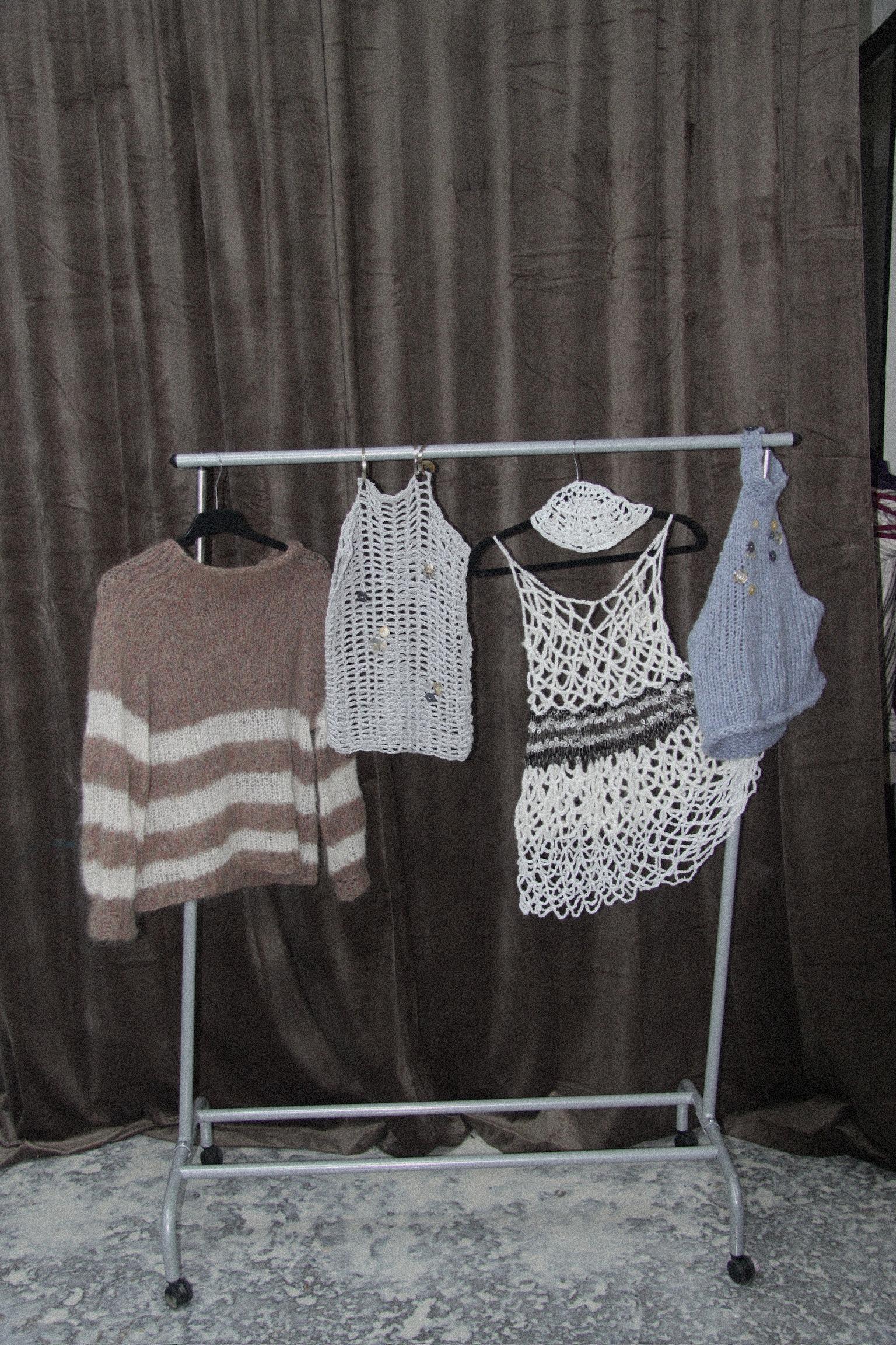 Knits on a clothing rack